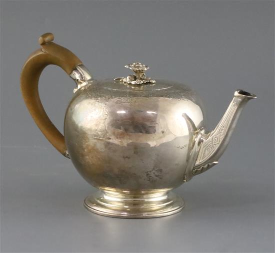 A Victorian silver bullet shaped teapot, by Walter Morrisse, gross 17oz.